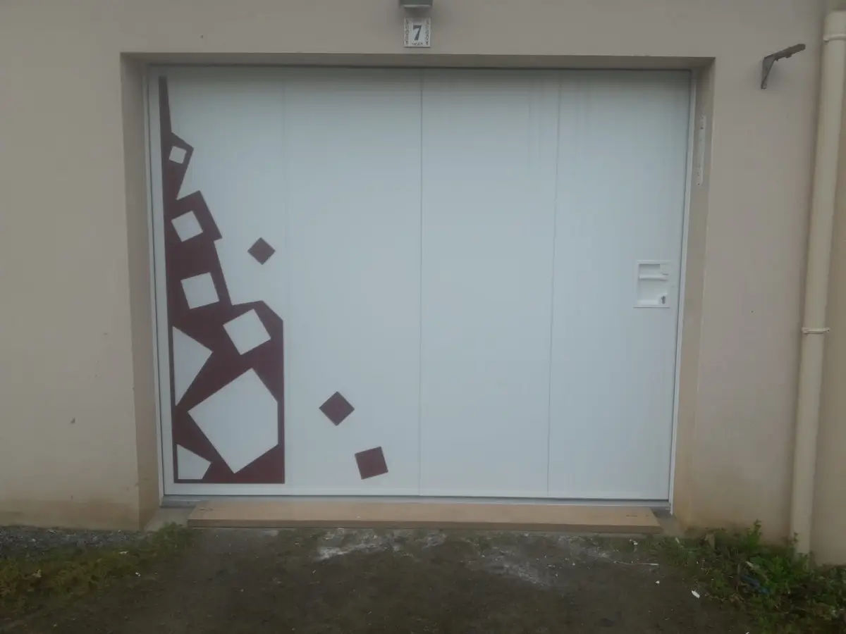 Porte de garage sectionnelle isolante